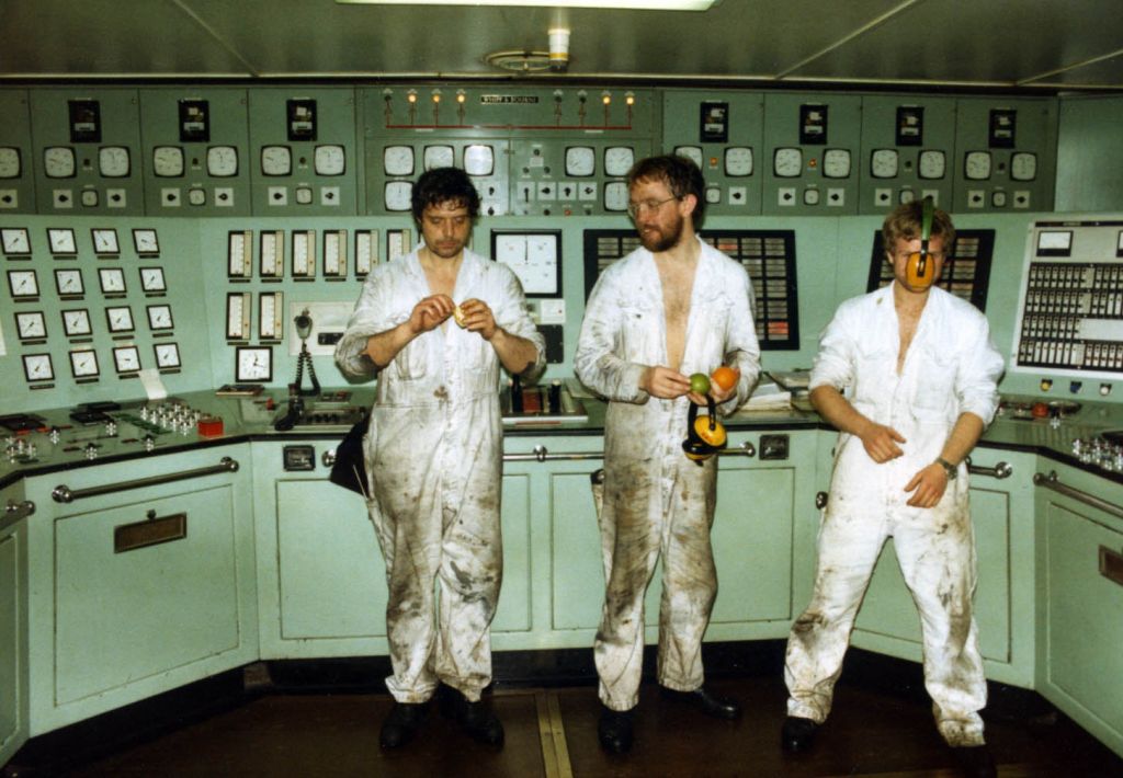 Steve Griffin, Steve Oatey, and ?
 Fort Austin MCR, South Atlantic 1983, pulling units! 
