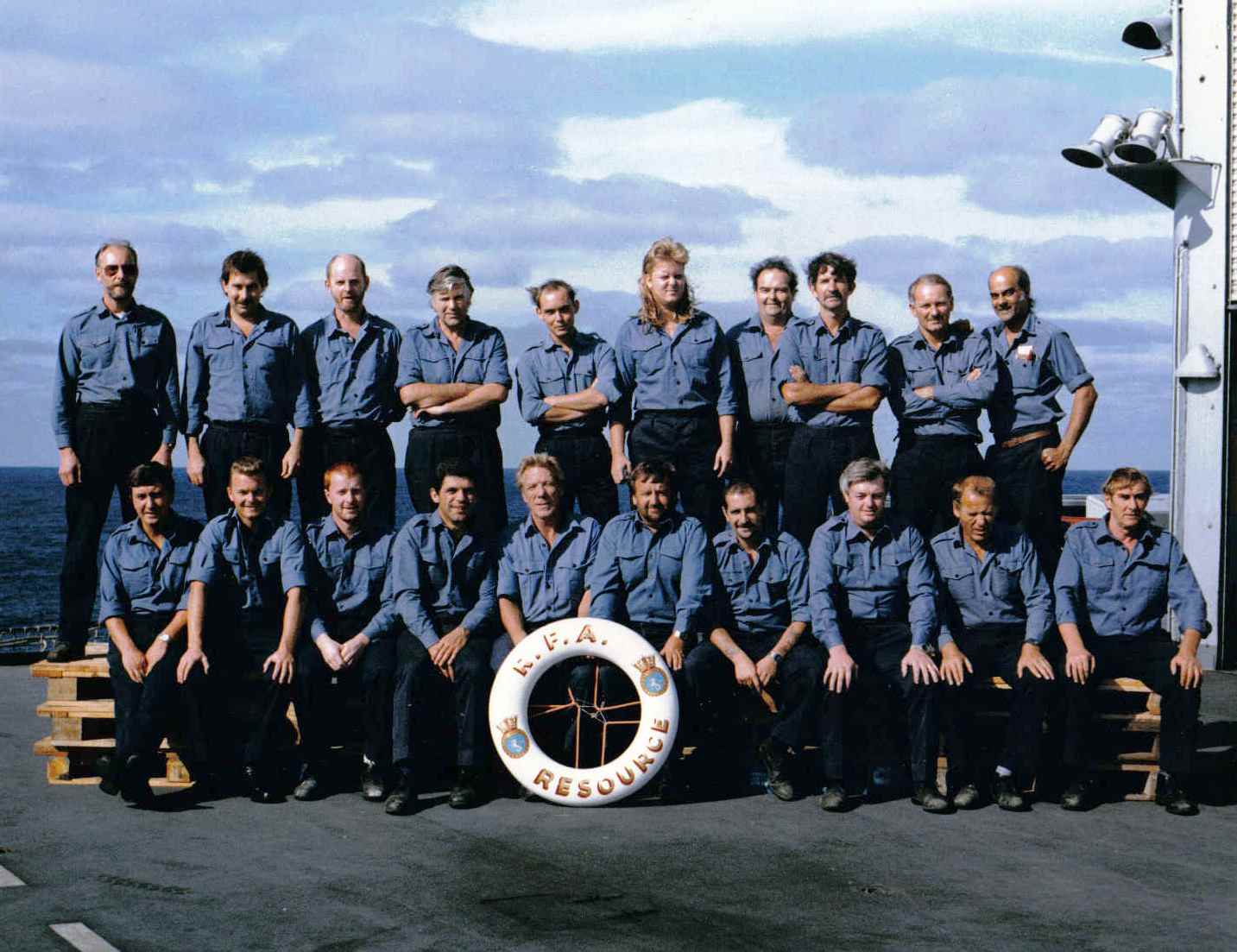 RFA Resource  STON(N) Stores Department SA’s and SSK’s. Feb 1990 at sea, Antigua.
Back row l-r Keith Fielding, Terry Strange, John Mountsy, ? Mark Oates,Graham Peden, ? Chris Friend, Dave Field, John Nair.
Front row l-r Ray Calderwood EMA, ? Dai Griffiths, Phil Watkins, ? Terry Dallamore EMA, Albie Vigus, ?, Graham Davies, Jim Murray.
