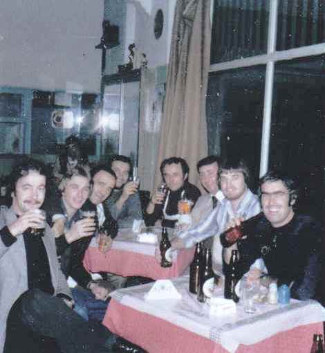  Dave Pierce, Bobby Walker, Andy Eastonin and Malcolm Jennings
 in Piraeus with some locals 
