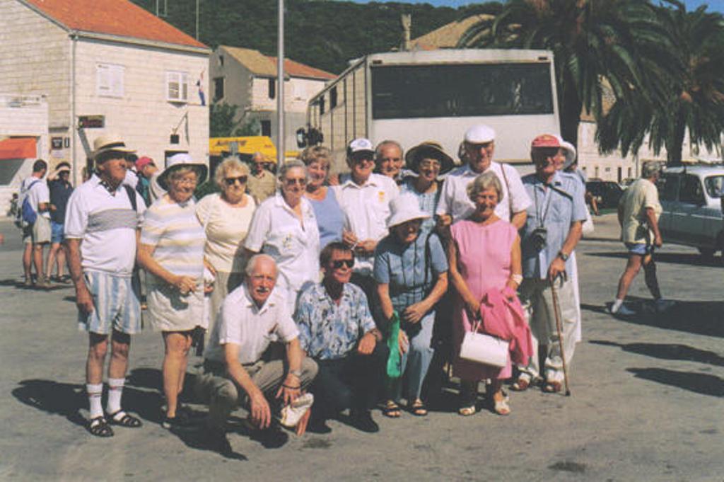   Ist Officer Jim Smith
 kneeling with sunglasses with members and wives of the WW2 Inshore MTB Squadron stationed on the island of VIZ Croatia. RFA Fort Grange 1999

