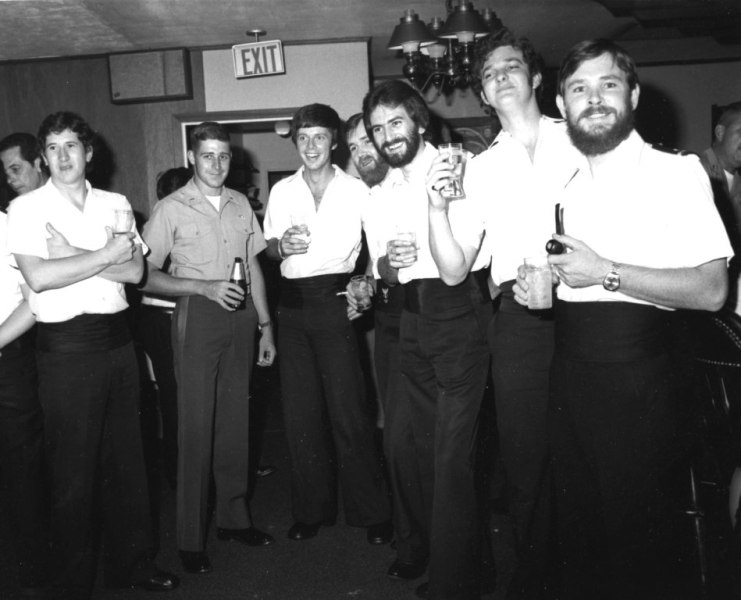 Bob Platt right and Rod Deller in the middle 
Resurgent ashore in US Club.
