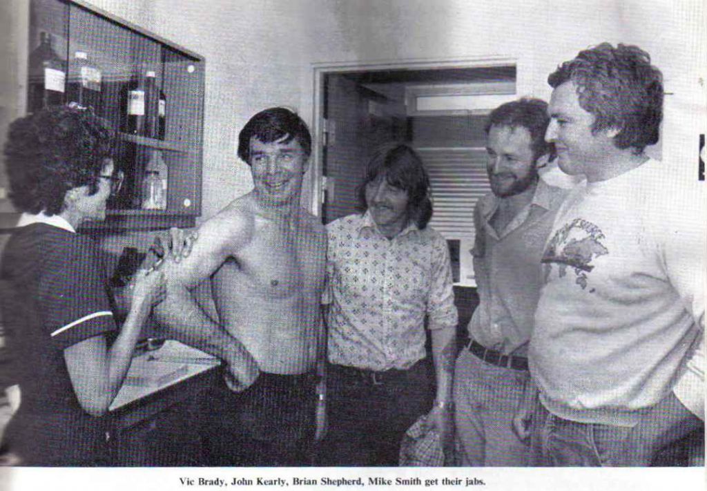 1982 - Jab Time.
Four STON staff having jabs prior to joining ships for the Falklands War. All from RNAD Ernesettle Plymouth. 
As at 2016-Nov, persons identified as:
L-to-R: Vic Brady, John Kearly, Mike Smith and Terry Pinhey. (caption on original is incorrect).
