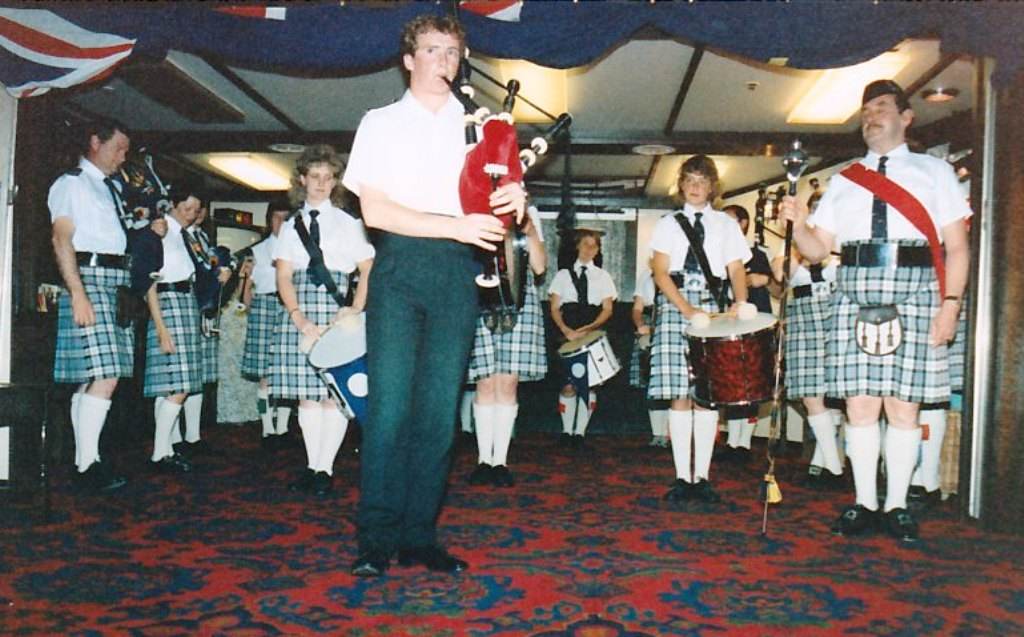Fort Grange Global 86 Freemantle
Mo McGee was Social Sec and organised a female Pipe and Drum Band (with minders). Deck Cadet played the pipes with them having practiced in the Command Shelter to the dismay of the QM.

