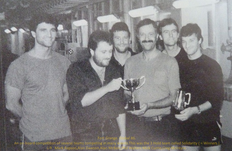Fort Grange - Global 86.
An on-board competition of several teams competing in many events. This was the 3 Hold team called Solidarity ( = Winners )

L-R   Mark Rapson,Alan Dawson,Alan McBain,Phil Walters Mick Currie,Creg McIntyre.

Pic via Phil Walters & David Soden.
