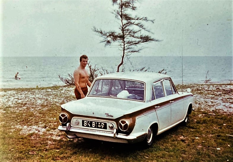 TIDESURGE - 1967 Singapore
Chris McClean with a Singapore Cortina
Keywords: McClean