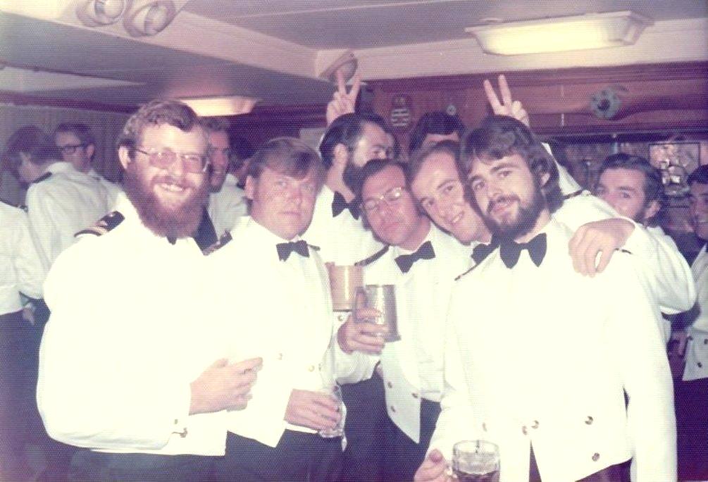 Resurgent 75 
Front L to R, Frank Ash, Jake Sanders, Mike Davis 1/L/O?, Phil Jones, Dave Knapp. Dickie Guy left back with glasses, Craig MacMillan behind Mike Davis, Dickie Bird with the fingers, Martin Seymour far right edge.


