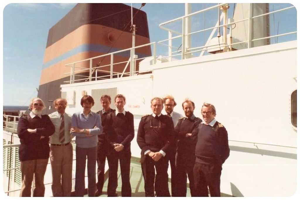  Scottish Eagle ~ February 1983 - STON and STUFT officers
Photo was taken in February 1983, after the ship had sailed from Berkeley Sound to Port William. 
L to R: 
N Sparrow PTO 3 GAWalker, G Lockett PTO 3 Scottish Eagle, P Brimacombe SOGD GAWalker, Lt Cd   V Jeffries BEO SNOFI, David Gearing, STO73D Tanker Ops, DST(FM), Captain Scottish Eagle, G Perry SOGD Scottish Eagle, Lt Cd Hawkes BEO Desig, Chief Eng Scottish Eagle.

See also:   https://www.bandcstaffregister.com/page4523.html  

 
