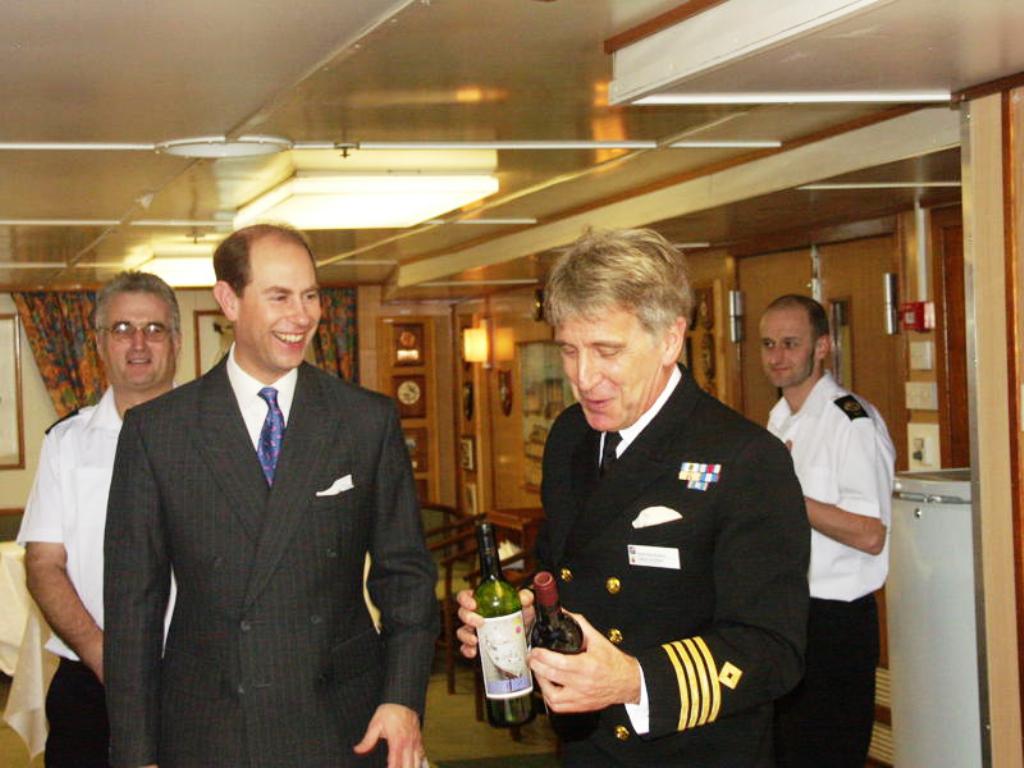Capt Ian Pilling
 presenting HRH Prince Edward with a few bottles of Fort Rosalie Special Plonk.

